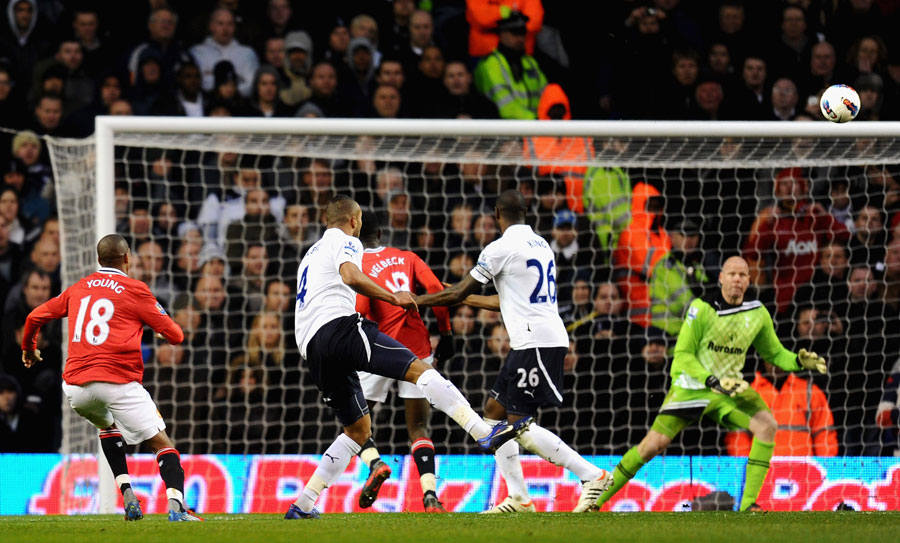 Ashley Young curls the ball past Brad Friedel
