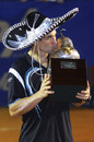 David Ferrer celebrates with his trophy