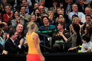 Caroline Wozniacki invites Rory McIlroy to join her on the court
