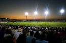The sun sets at the County Ground and the lights take effect