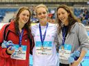 Becky Turner, Fran Halsall and Amy Smith pose after the women's 100m freestyle

