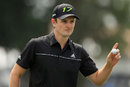 Justin Rose acknowledges the crowd