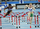 Sally Pearson powers clear of Tiffany Porter