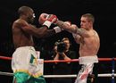 Ricky Burns catches Paulus Moses during the WBO lightweight title fight