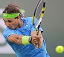Rafael Nadal returns a shot to Marcel Granollers