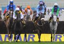 Albertas Run ridden by AP McCoy leads on the first circuit of the Ryanair steeple chase