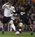 Gareth Bale battles with Ryo Miyaichi