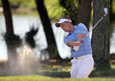 Luke Donald hits out of the bunker