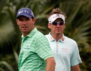 Padraig Harrington and Ian Poulter watch the action