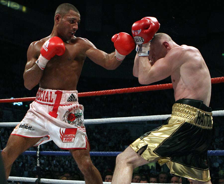 Matthew Hatton covers up as Kell Brook attacks