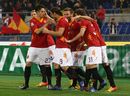 Roma players celebrate after scoring