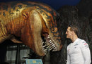 Michael Schumacher checks out a dinosaur
