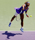 Serena Williams powers down a serve