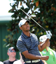 Tiger Woods reacts to a sub-standard shot