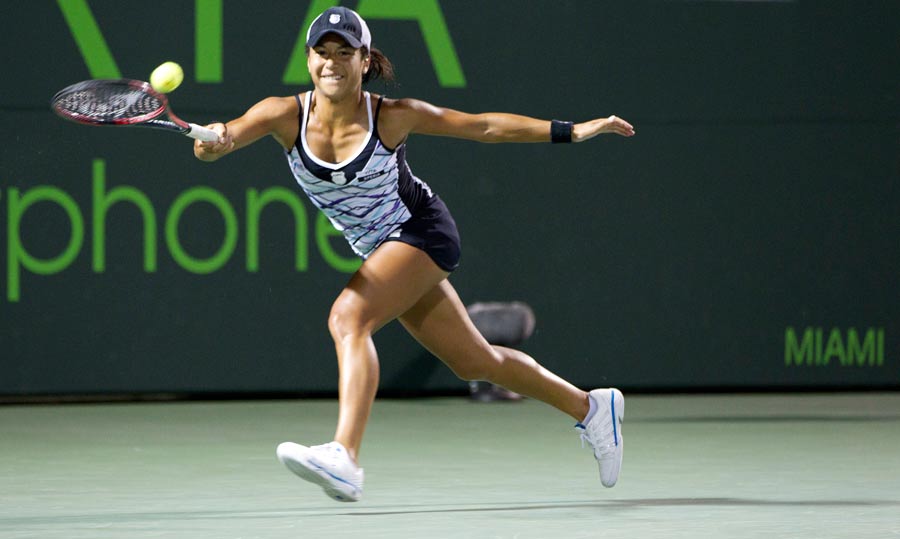 Heather Watson stretches for a forehand