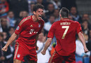 Mario Gomez celebrates with Franck Ribery