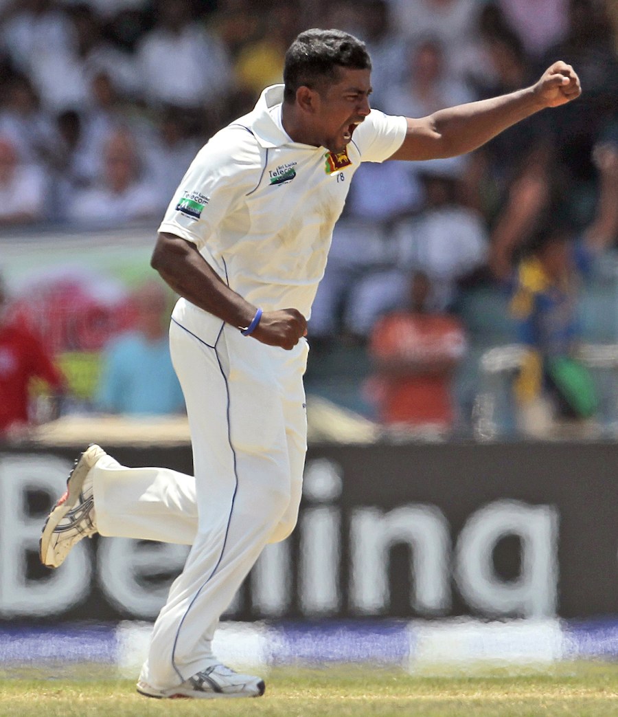 Rangana Herath celebrates Ian Bell's wicket