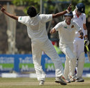 Suraj Randiv celebrates Kevin Pietersen's wicket