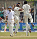 Sri Lanka celebrate the wicket of Monty Panesar