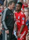Kenny Dalglish gives Raheem Sterling some instructions