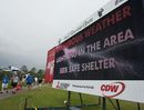 Patrons head for cover during a lightning delay