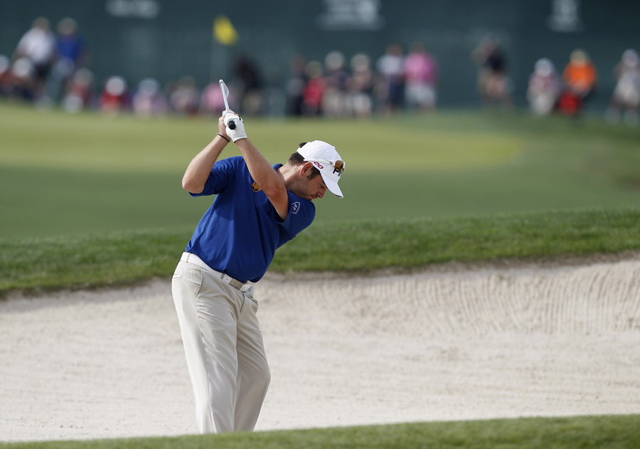Louis Oosthuizen escapes from a bunker