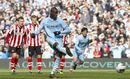 Mario Balotelli scores from the penalty spot
