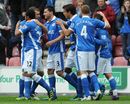 Wigan celebrate after Antonin Alcaraz scores from a header