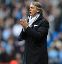 Roberto Mancini prays for a miracle