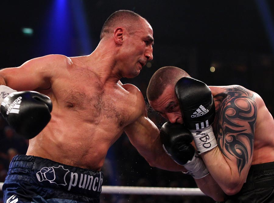 Arthur Abraham exchanges punches with Piotr Wilczewski