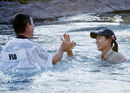 Sun Young-Yoo and her caddie Adam Woodward celebrate victory by jumping into the water