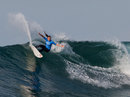 Niki Van Dyke surfs a wave