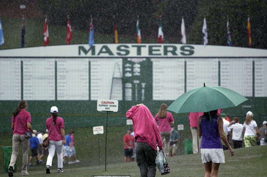 Patrons leave the course after play is suspended