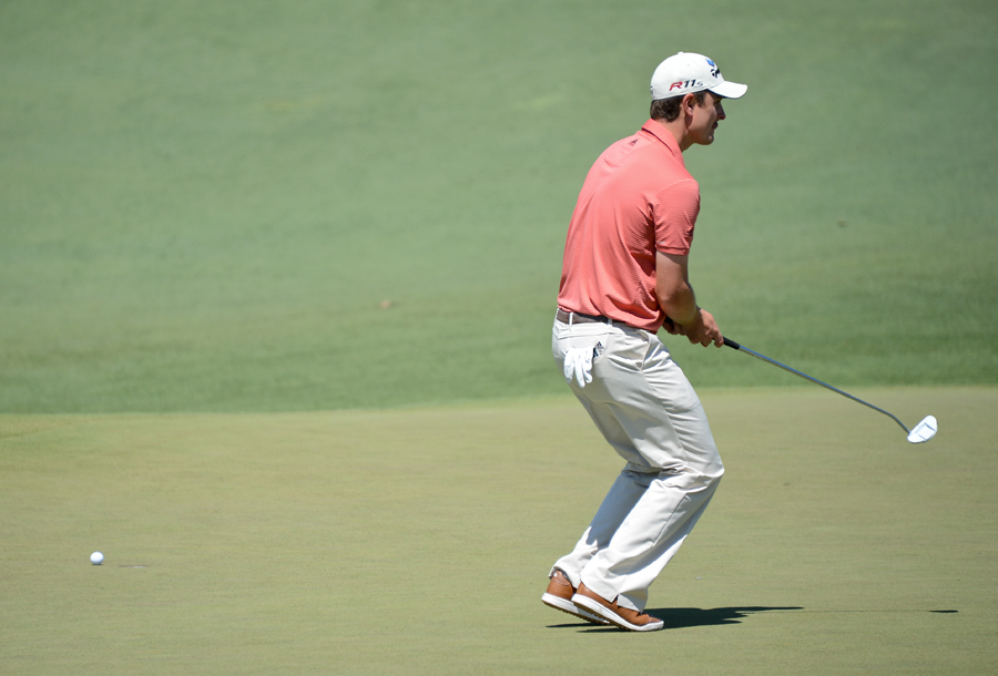 Justin Rose reacts to a narrowly missed putt