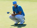 Hunter Mahan reacts to a missed putt
