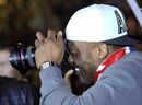 Dereck Chisora photographs with a camera
