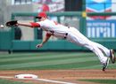 Mark Trumbo of the Los Angeles Angels dives for a catch