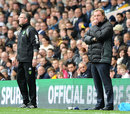 Paul Lambert and Harry Redknapp watch the action from the technical area