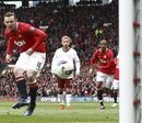 Wayne Rooney slots home from the penalty spot
