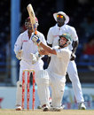 Michael Hussey launches a six over midwicket