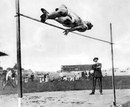 Harold Osborn cleared 1.98m to win the high jump