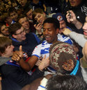 Mikele Leigertwood is mobbed by Reading fans 