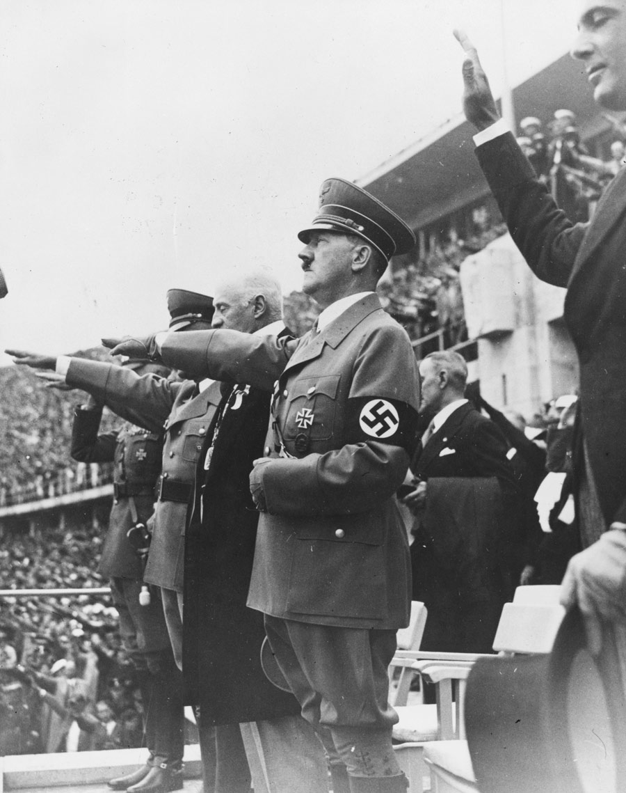 Adolf Hitler salutes the crowd
