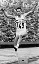 Britain's Lynn Davies soared to gold in the long jump