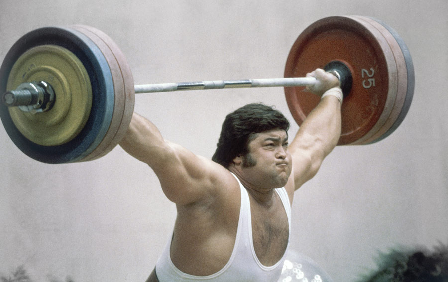 Soviet weightlifter Sultan Rakhmanov lifted a combined weight of 440 kilograms to win the gold