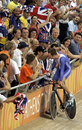 Bradley Wiggins led Britain's charge in the velodrome, winning a gold, silver and bronze