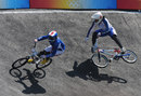 There was heartbreak for Great Britain's Shanaze Reade who crashed as France's Anne-Caroline Chausson took gold in the BMX