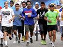 Manny Pacquiao jogs along with his fans