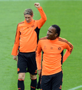 Fernando Torres and Didier Drogba limber up