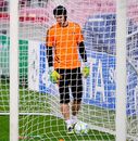 Petr Cech stands in goal during a training session